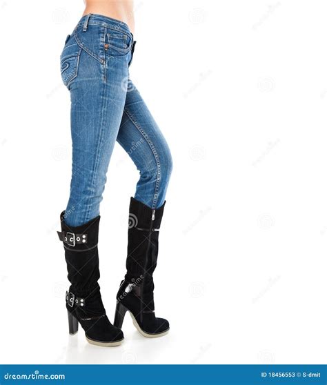Female Legs In A Blue Jeans And High Boots Stock Image Image Of