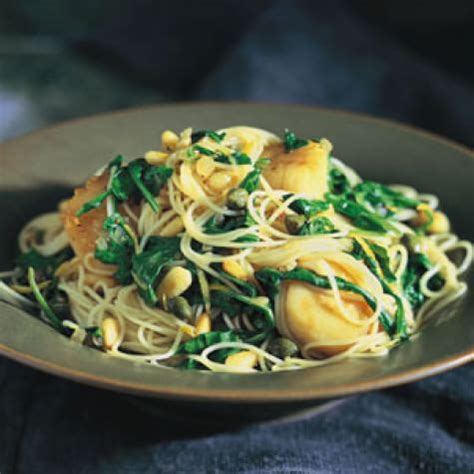 I like this recipe with regular spaghetti noodles because of the hardy texture. Angel Hair Pasta with Scallops and Arugula | Williams Sonoma