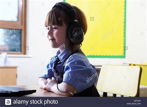 Young Girl Wearing Headphones High Resolution Stock Photography And