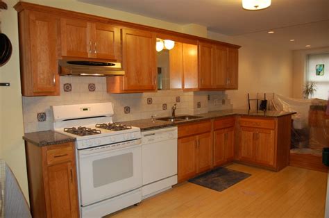Leave the cement to partially dry, returning in about 10 minutes. How to Refinish Wood Kitchen Cabinets
