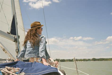 Woman Relaxing On Sailing Boat Enjoying Summer Vacation Stock Image