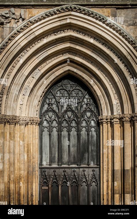 Ornate Gothic Door Arch Detail To York Minster Cathedral Stock Photo