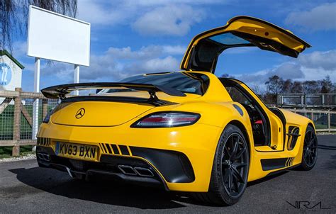 This is the new mercedes sls amg for people who like trackdays or just fancy trading some gt qualities to unlock even bigger thrills. Yellow Mercedes-Benz SLS AMG Black Series - GTspirit