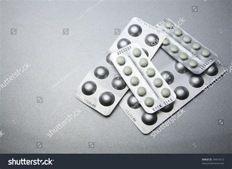 Silver Pills On Metal Table Background Copy Space Stock Photo 34431613