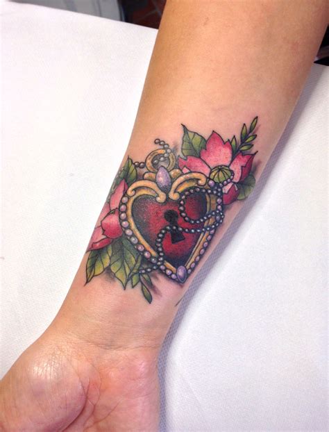 heart padlock and flower tattoo cover up