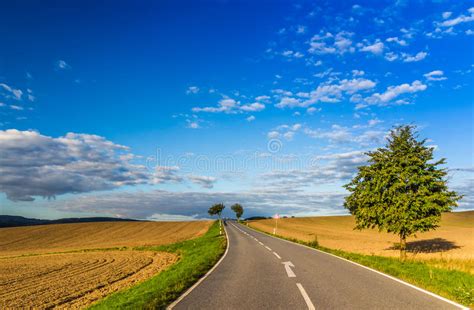 Road On Green Hills And Sun Blue Sky Stock Image Image Of Country