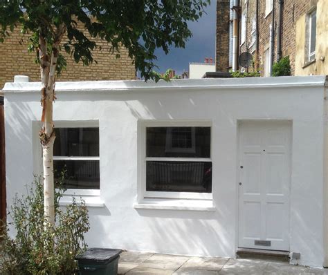 Londons Smallest House Uses Flexible Plywood Furniture To Maximize