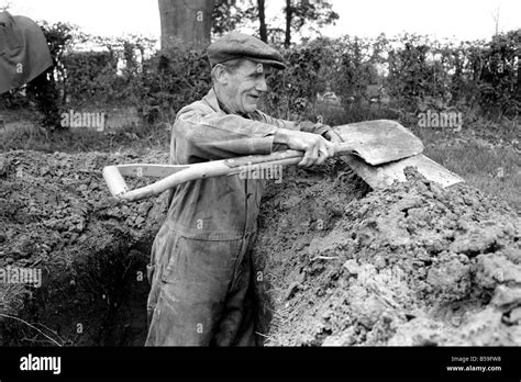 Is Work Wonderful Feature Grave Digger At Work In The Grave Yard Of