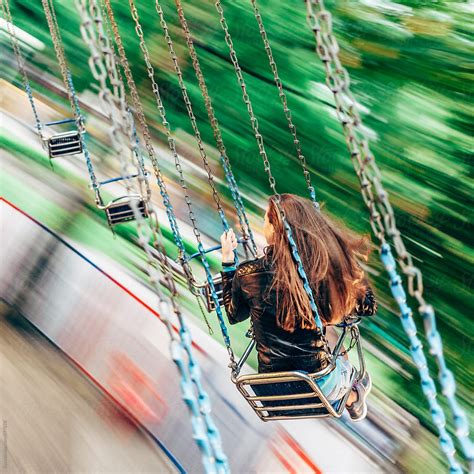Woman Fun Outdoors Amusement Park Swing Ride By Stocksy Contributor