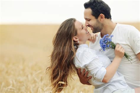 Sensual Young Couple Having Fun Outdoor In Summer Field Stock Image