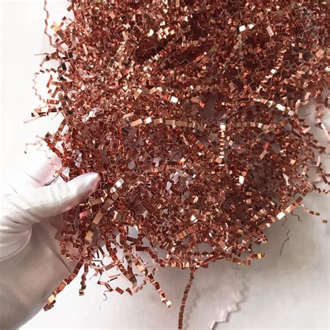 Shredded paper comes in many styles and has even more uses! Rose Gold Decorative Raffia Shredded Paper for Candy Boxes Filler