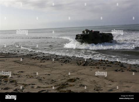 U.S. Marines with 3rd Assault Amphibian Battalion land at Marine Corps