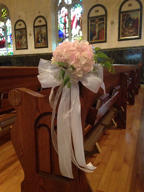 Simple And Elegant Pew Decorations With A Stunning Pink Hydrangea