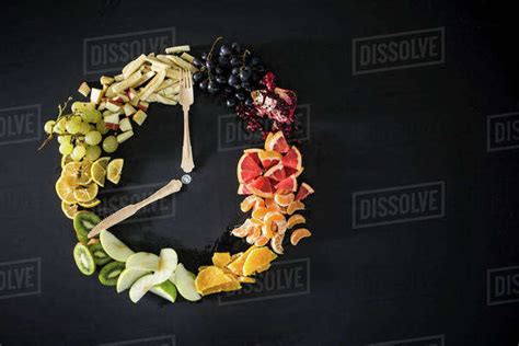 Clock Made With Fruit Vegetables And Flatware Stock Photo Dissolve