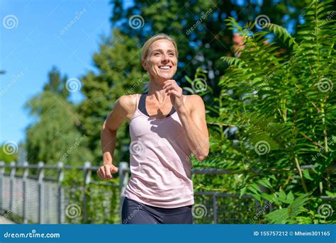 Happy Healthy Woman Jogging Outdoors Stock Photo Image Of Sport
