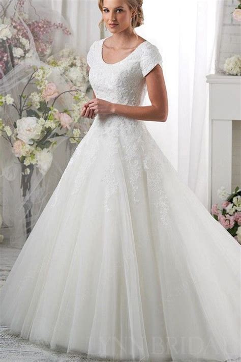 Find your princess wedding gown with maggie sottero's collection. Classic Tulle Short Sleeves Princess Modest Wedding Dress ...