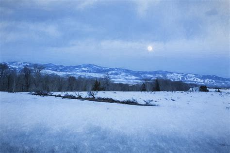Full Moon Over A Field Of Snow Photograph By Belinda Greb