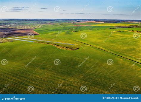 Bird`s Eye View Of A Green Field Sowing Campaign In Belarusnature Of