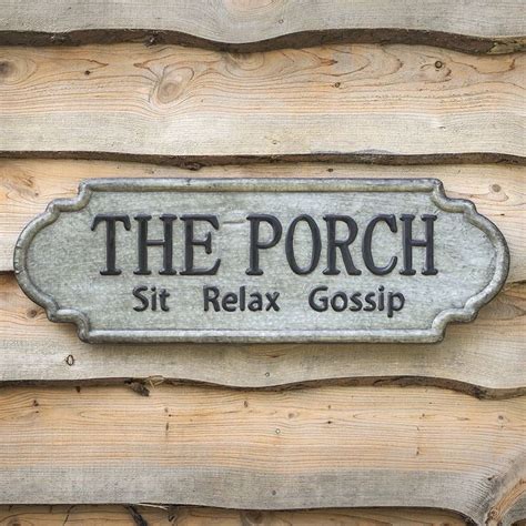 Sit Relax and Gossip The Porch Metal Sign measures 36 W x 12¼ H
