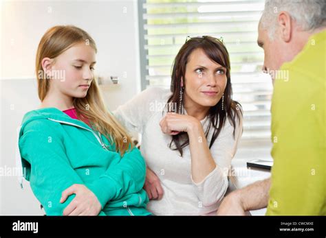 Parents Scolding Daughter At Home Stock Photo Alamy