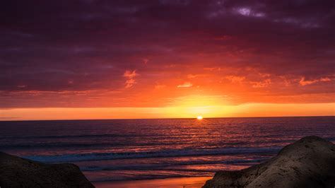 5120x2880 Orange Horizon Rock Cliff Sunset 5k Hd 4k Wallpapers Images