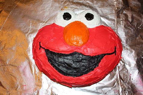 Elmo Cake Pan From Michael S Used Wilton Food Coloring To Get The Red Elmo And Cookie Monster
