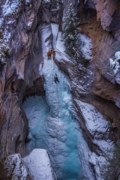 Ice Climbers On A Frozen Waterfall At Maligne Canyon It Is One Of The