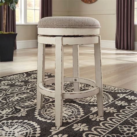 Give Traditional Cottage Design A Spin With This Upholstered Swivel Stool Sturdy Wood Frame Is
