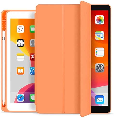 An Orange Ipad Case Sitting On Top Of An Apple Ipad Air 2g Tablet Computer