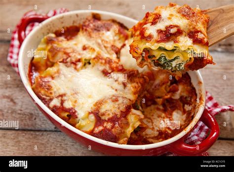 Italian Lasagna Rolls With Tomatoes Spinach And Ricotta Cheese Stock