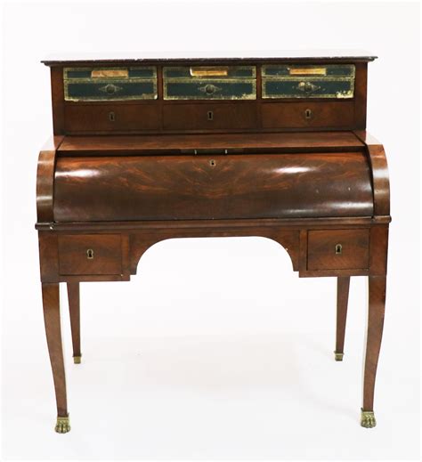 This writing desk has been designed with the french designing concept into it. Lot Detail - Early 19thC French Mahogany Writing Desk