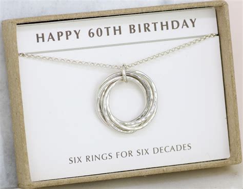 Your husband's 60th birthday is coming up quickly. 60th Birthday Silver Necklace | 6 Rings for 6 Decades ...