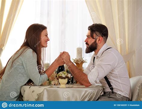Young Couple In Love At Table Celebrate Romantic Dinner Stock Image Image Of Food Holiday