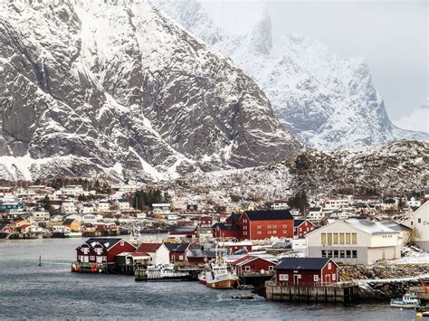 Colorful Houses On Coast At Snowy Mountains Norway Lofoten Free Image