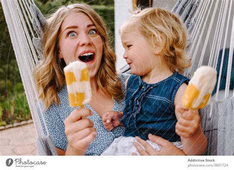 Happy Little Girl And Woman With Homemade Popsicles A Royalty Free