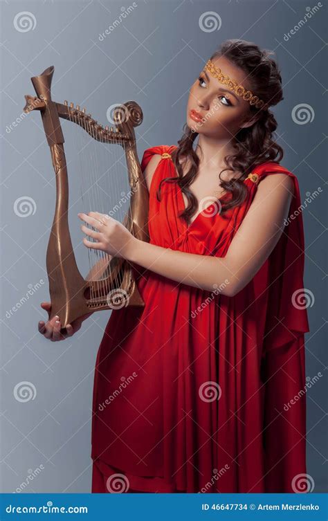 Beautiful Young Girl Playing The Harp Stock Photo Image Of Lady