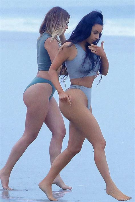 Kim Kardashian Slips Into A Bikini To Get Some Beach Workout With Her