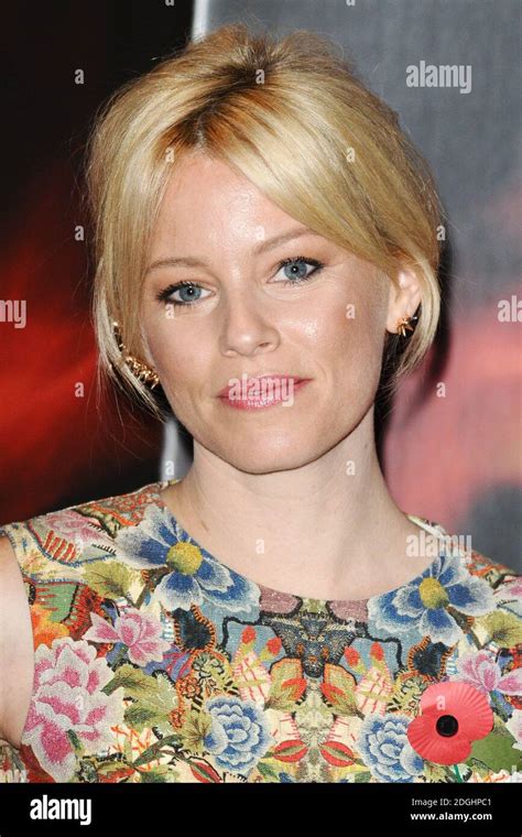 Elizabeth Banks Attends A Photocall For The Hunger Games Catching