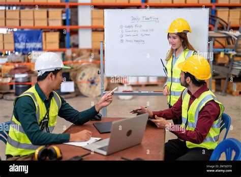 Group of worker in the warehouse factory conduct toolbox talk daily