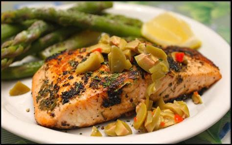 Place salmon, skin side down, on the prepared baking sheet and pour 1/2 of the dressing over the filets. Mediterranean Salmon | Low Sodium Grilled Salmon Recipe ...