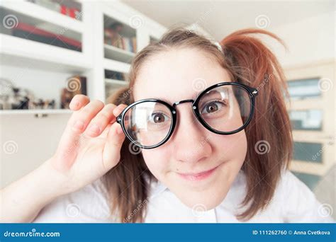 Portrait Of Funny Pretty Nerdy Girl With Ponytails In Glasses Stock Photo Image Of