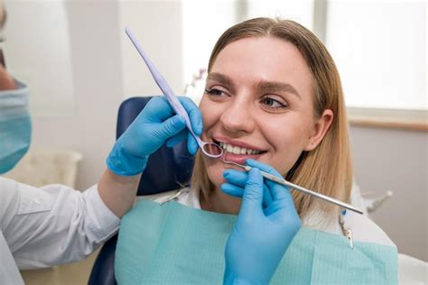 Premium Photo Closeup Of A Dentist In A Mask And A Patient A Dentist