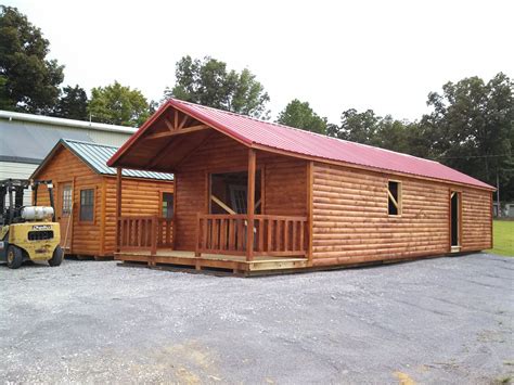 More than 600 square feet in a single unit and over 1200 square feet. 2 New cabins completed. One green, one red metal roof. We ...