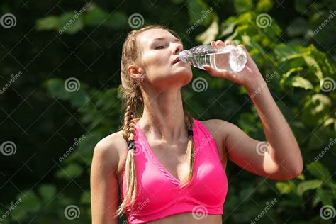 Sporty Mature Woman Drinking Water After Jog Stock Photo Image Of