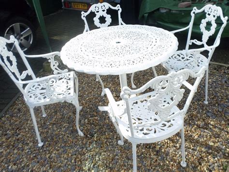 4.6 out of 5 stars. LOVELY OLD CAST METAL GARDEN TABLE AND 4 CHAIRS | in Christchurch, Dorset | Gumtree