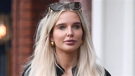 Helen Flanagan Shows Off Her Slender Physique In A Skin Tight Black Jumpsuit As She Pushes A