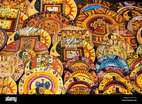 Traditional Peruvian Souvenirs Oil Painted Wooden Plates At Pisac