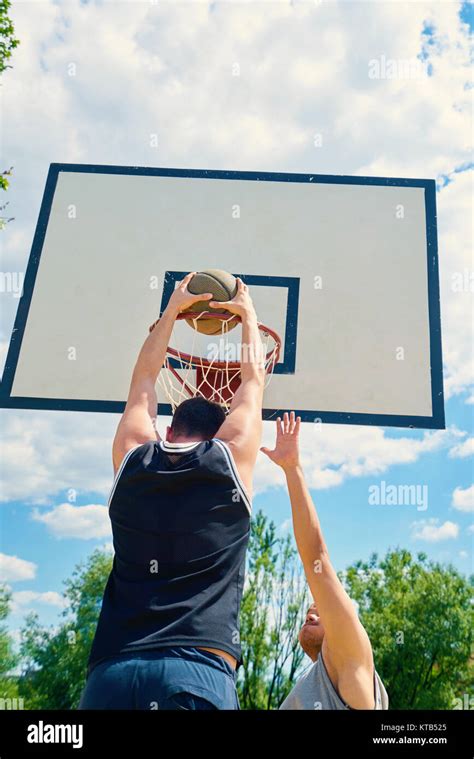 Young Boys Playing Basketball Stock Photo Alamy
