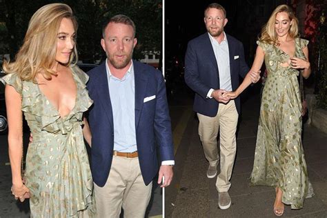 Guy Ritchie Leads Glamorous Wife Jacqui Ainsley By The Arm On Night Out The Scottish Sun