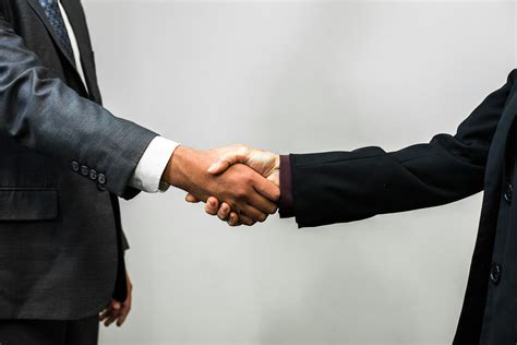 Handshake Man And Woman Hispanic Businessman Shakes Hand Flickr